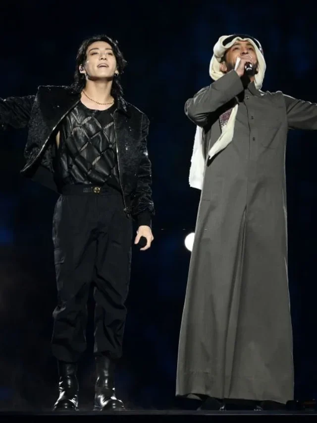 Jung Kook of BTS performs with Fahad Al Kubaisi during the opening ceremony prior to the FIFA World Cup Qatar 2022